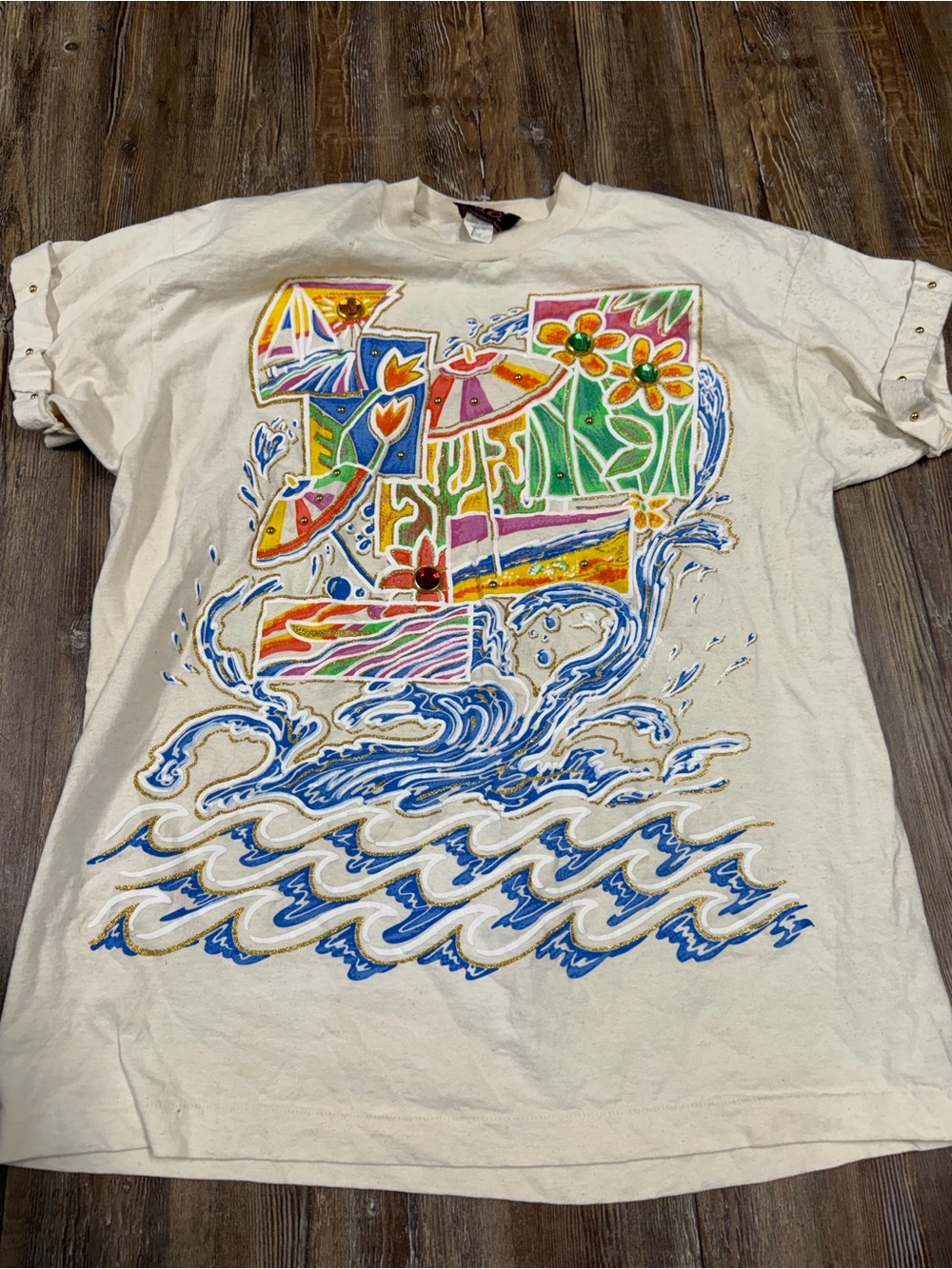 Vintage 90s PCB Surf T-Shirt with graphic of a stylized figure with flowers and